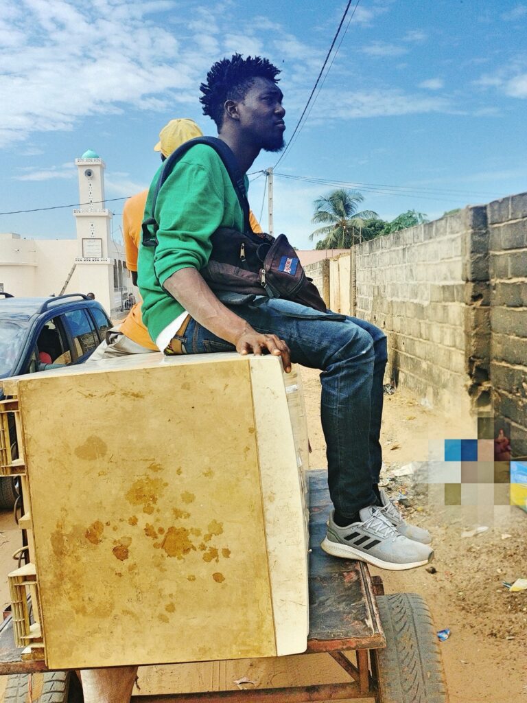 Lamin on a donkey-cart