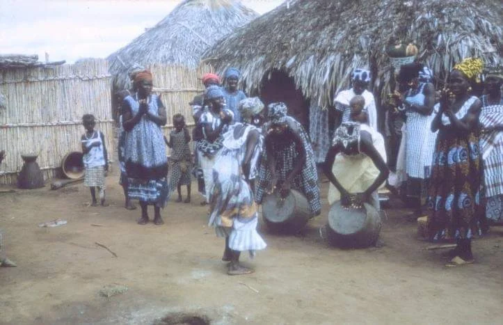 gambian women dancing and singing in group