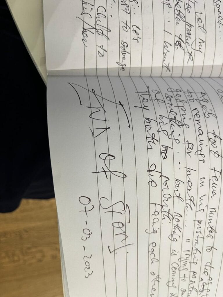 Where the actual writing happened — notes open, keyboard ready.*