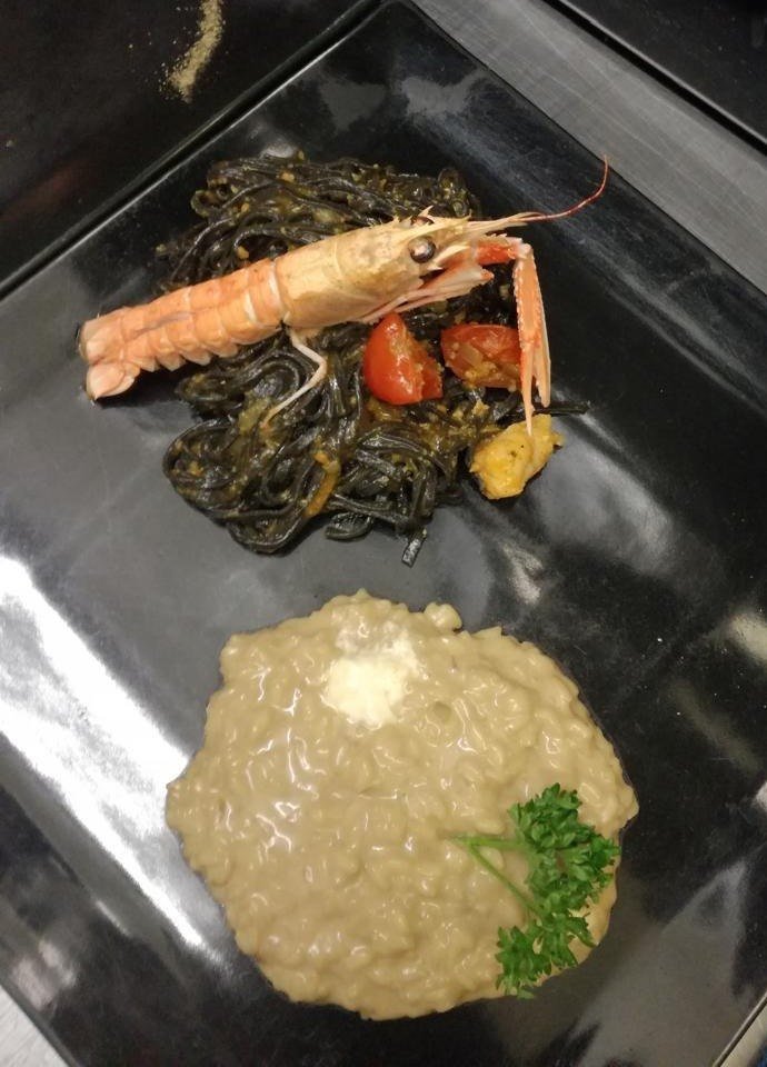 Squid-ink tagliolini with scampi, and a risotto