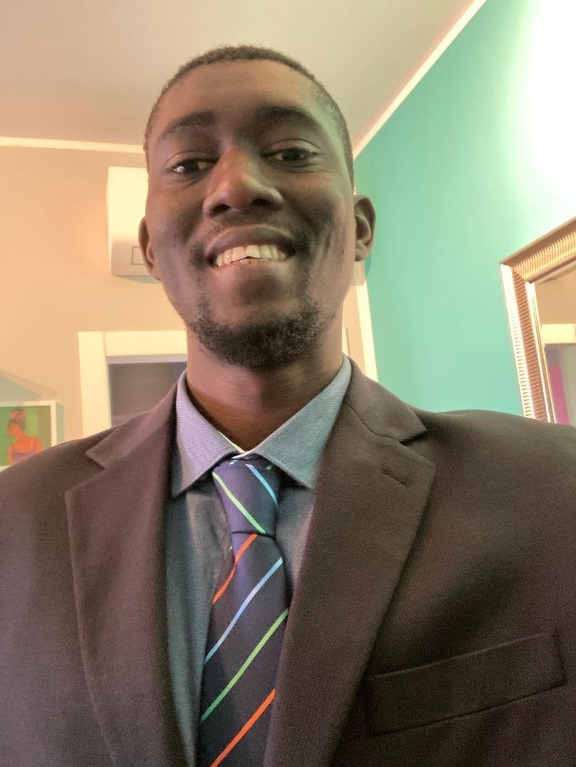 In a suit, in the estate agency years